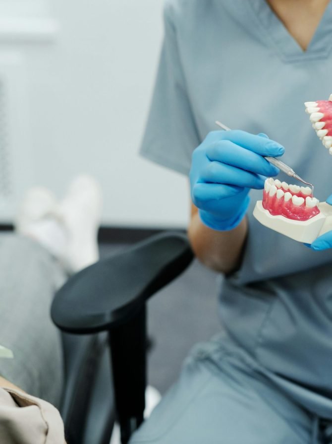 Dental professionals discussing patient's treatment plan